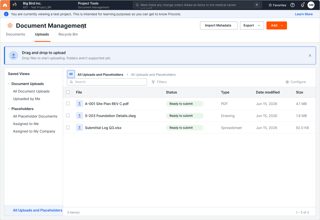 First-visit discoverability banner in Procore Document Management prompting users that drag-and-drop upload is now available